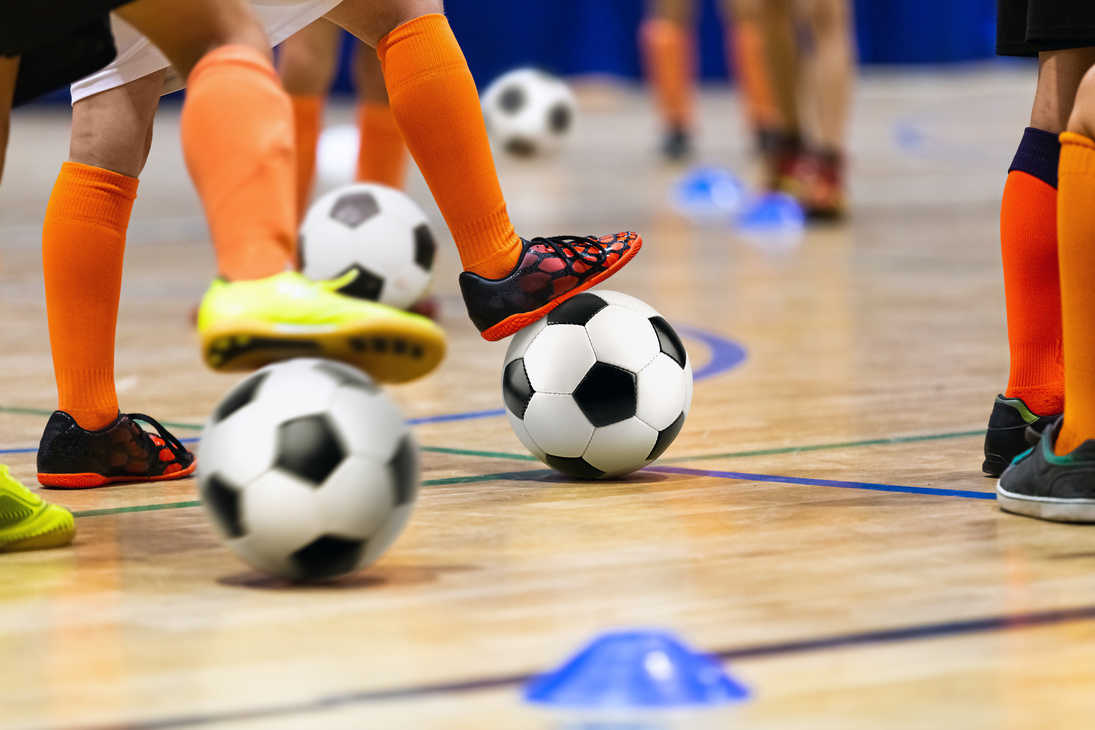 Indoor Soccer Class for Kids at School Sports Hall. Children Kic